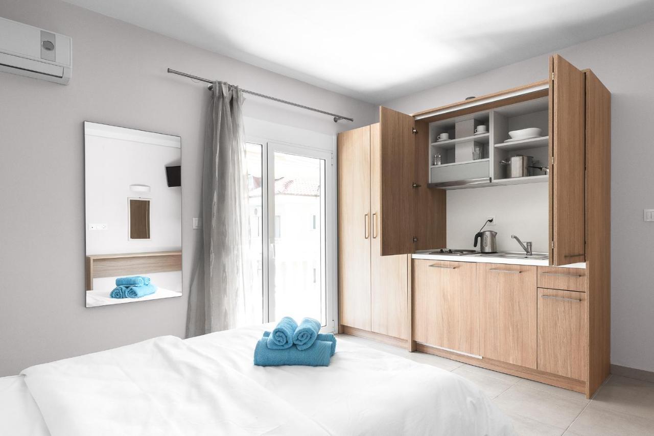 Апартаменты Blue Flag, Nilie Hospitality Mgmt Олимпиаки-Акти Экстерьер фото